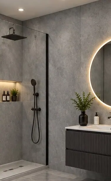 Shower room lined in DB Homés Concrete Matt PVC wall panels with matt black brassware and a dark vanity unit
